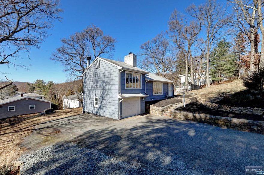 Recently renovated house with in ground salt water swimming pool ready for summer fun ! 5 bdrs and 2 full baths, large living room with wood burning fire place. Hard wood floors throught the main floor. Brand new kitchen with stainless steel appliances. Ground floor features brand new floors, modern style bathroom with free standing tub and private bedroom. List of recent updates: new swimming pool liner and pump, updated 220 amp electricity, new fence, some new european style windows, new hot water tank.