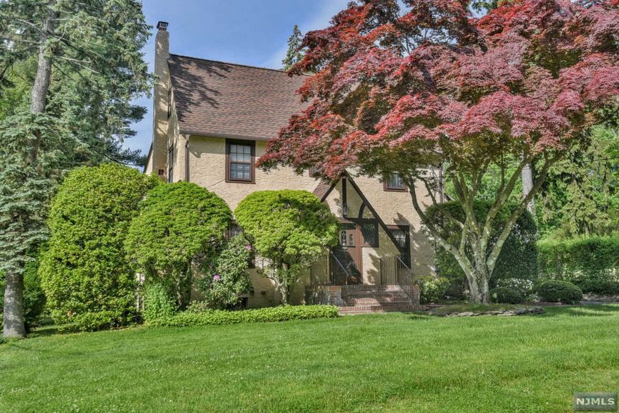 On beautiful property, this 3BR/2.5BA w/2 add'l rooms on the 3rd fl is not to be missed. The lovely ent opens into a generous 1st floor. LR w/fpl, DR, updated MEIK and FR with arched bay window overlooking a lg mahogany deck and private yd provide a perfect setting for holiday gatherings. The Primary suite with lg bath w/sep tub and shower, 2 add'l BR's and B/SOT complete the 2nd floor while 2 rooms on the 3rd floor are ideal for office, gym or guest room. New high efficiency 5 zone heating system, 2 zone CAC(includes 3rd fl), hdwd floors, 2 car garage w/loft and sep shed area, unf basement, newer sewer line and chimney are among the home's many amenities. This home has a great history and has been lovingly maintained and updated for 36 years by its present owners. Ramsey boasts a vibrant downtown with many trans options, 2 train stations, restaurants and shopping. Award winning schools, farmers' market and community pool are a few of the reasons to call this special place home.