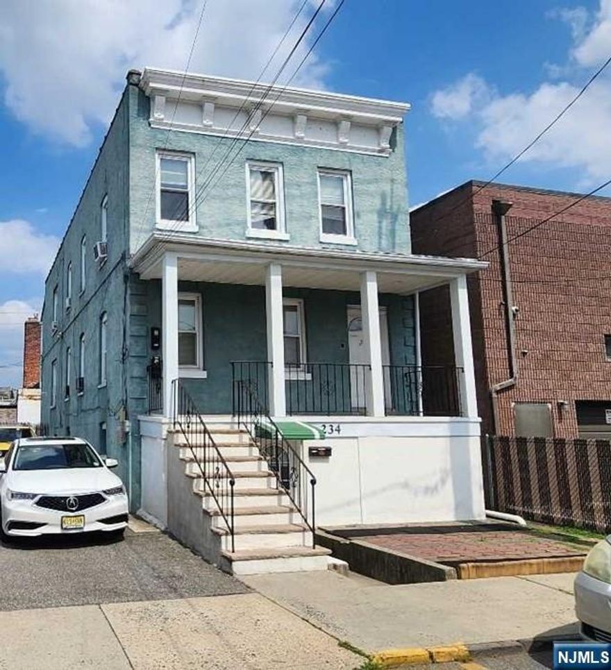 Legal Three family on Double Lot with multiple parking spaces. Lower Level: 2 BR, 1 Bath, 1st Floor: 3 BR, 1 Bath, 2nd Floor: 3BR.1 Bath. All separate utilizes. Three Furnaces, Three HW Tanks. Fully Occupied. Updated electrical. High Ceilings.