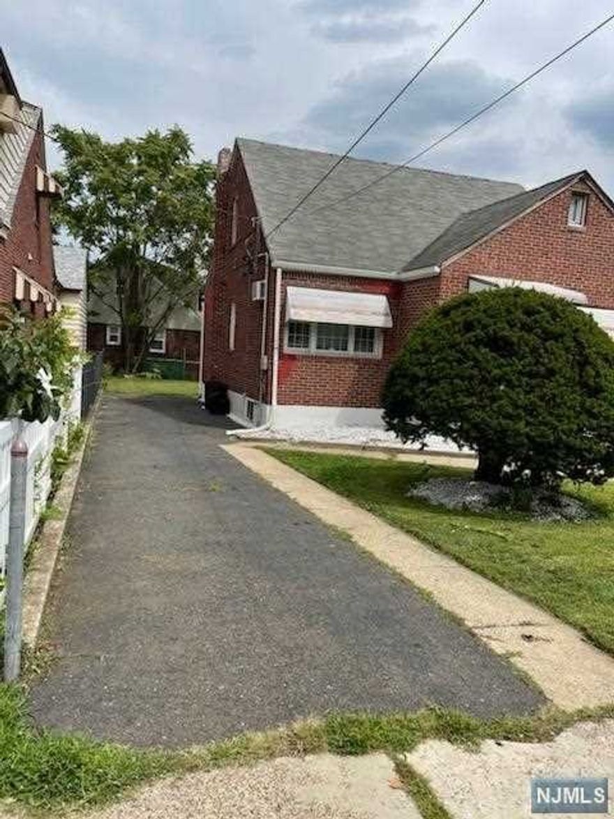 Four Bedrooms Home in need of TLC. Two bedrooms On First Floor.. Two on Second Floor. Living room -Large kitchen-Dining room- Exit to Back-Yard Unfinished Basement- Sold As Is . No repairs credits will be given .