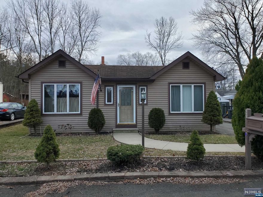 Detached, ranch with 1 bed, 1 bath that is perfect as a weekend getaway or a year around home. The kitchen has wood floors, stainless steel appliances and lots of windows for natural light.