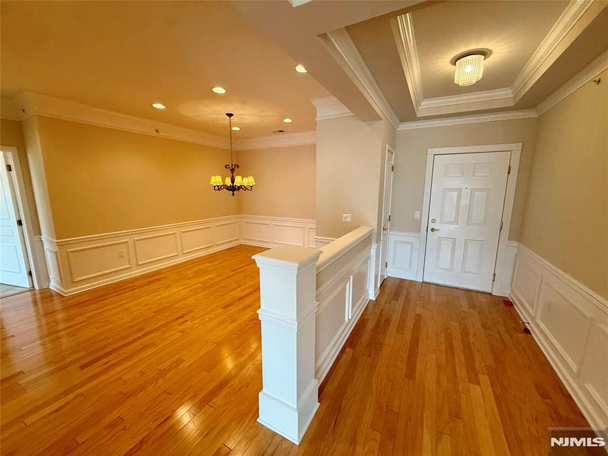 INTERIOR PICS COMING SOON! Gorgeous 2 Bedroom, 2 bath, 4th floor condo in a beautiful 55+ gated community with 24 hour security. Freshly painted with the same beautiful, neutral designer color throughout. Featuring a spacious eat in kitchen with beautiful corian counters & pantry. Large formal Living Rm with sliders to a spacious balcony. Formal dining room with plenty of room for holiday dinners. Spacious den with beautiful French doors. Spacious laundry room. One assigned parking space in the garage, underneath building with additional parking outside. Amenities include beautiful crown moldings, tray ceilings, chair rail, architectural trim work throughout and stunning pillars as you enter through the foyer. Clubhouse with Cafe features activity director with over 40 clubs to join. There is so much to do here with a lifestyle community sure to meet your social, recreational and fitness needs! Amenities include indoor and outdoor pools, theatre, live shows, exercise room, saunas, hot tub, art studio, ballroom, billiard room, tennis courts, bocce & shuffleboard and so much more. In addition to all the amazing amenities, HOA also includes water/sewer, cable & internet. Being Sold - As-Is No known defects.