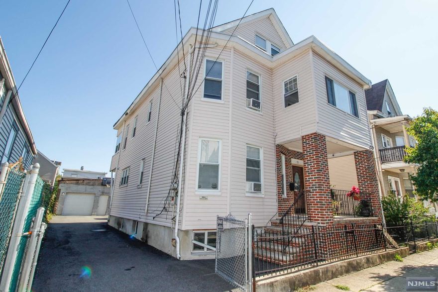 Legal 2 family. Unit 1 has a Living Room, eat in kitchen 2 full baths, 2 bedrooms, family room and den. The basement area includes a utility room and washer and dryer. Unit 2: has Living room, eat in kitchen, 2 full baths, 2 bedrooms, family room and den. Off street parking with 2 car detached garage. Pergola for outdoor entertaining. Public utilities, natural gas heat. separate meters for each unit. The sellers request suitable time to find new housing