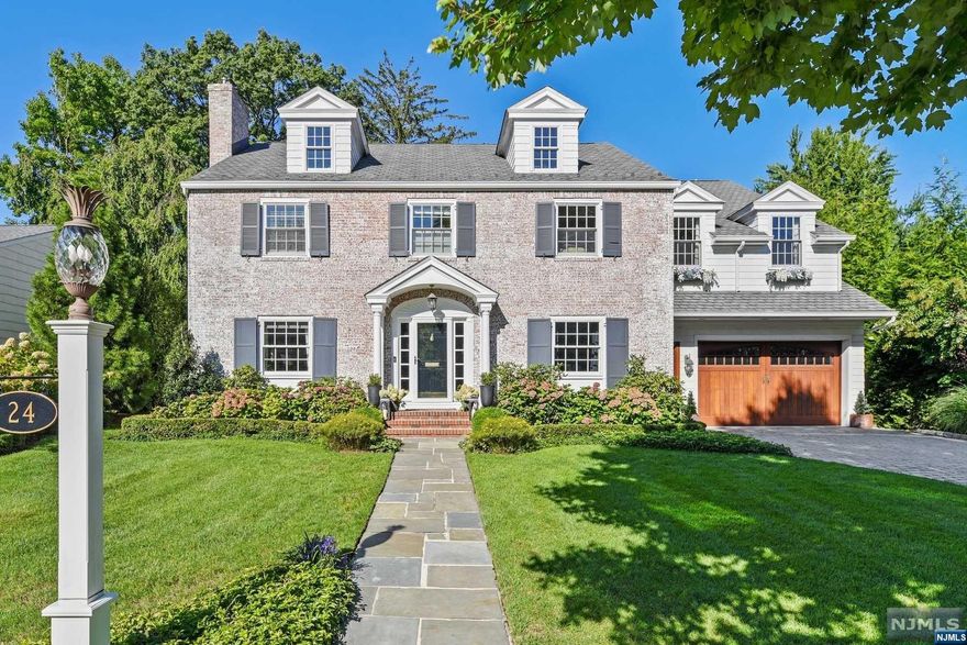 Manifest your best life: East Hampton meets Montclair! Impeccable design & use of space from top to bottom! Warm & Welcoming Entry Hall. Formal LR w/WBFP, built-ins, & French doors. Bright FDR and a stunning Kitchen & Family Room space out back leading you blissfully outdoors. Coffered ceiling, expansive windows, high end appliances, magnificent stone countertops, gas fireplace, homework center, laundry room - all beautifully planned so you can live your best life doing the everyday. The 2nd Flr with restorative primary ensuite w/vaulted ceiling, gas FP, reading nook, spa bath & walk in closets, 3 additional bedrooms, amazing Office & 2 baths. 3rd floor perfect for guests or teenagers! Finished lower level w/wine room, service bar, rec room & gym. Out back, the blissful hardscape with Hampton's style salt water swimming pool & stone fireplace. A most pleasurable oasis, conveniently located between two parks. 13 miles from NYC. A home to give you dreams you didn't know you had.