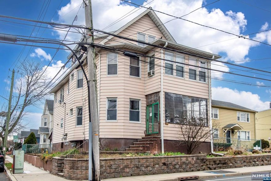 Wonderful opportunity to own a two family home in one of the finest sections of Clifton! Each unit offers 2 bedrooms, full bathroom, eat-in kitchen, full formal dining room, and a living room plus lots of storage space. It has a two car garage and a full basement with storage units built in. The water heaters are one year old and the boilers are only 5 years old. The garage doors are newer. The 3rd floor is a tremendous attic with endless possibilities.. This house is located in a most convenient location, close to public transportation, the hospital and shopping. Don't miss this truly great buy!