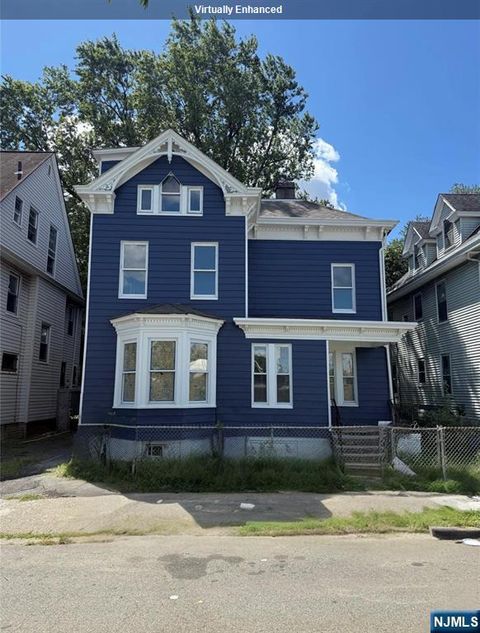 Photo of 15 Winthrop Terrace, East Orange, NJ 07018 (MLS # 25044047)