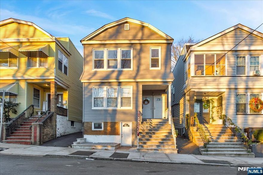 Discover this beautifully renovated 2-family home featuring two spacious 3-bedroom units. Located in sought-after City of Newark. A fantastic opportunity for both owner-occupants and investors. Both units features the same open lay out with 3 spacious bedrooms, 2 bathrooms, and a lovely eat-in kitchen with lots of storage. Each unit has its own utilities. The walk-out basement offers potential for additional storage or future customization. It has a long blacktop that can fit up to 5 cars. Don't miss out on this prime opportunity! Act quickly this property won't stay on the market for long.