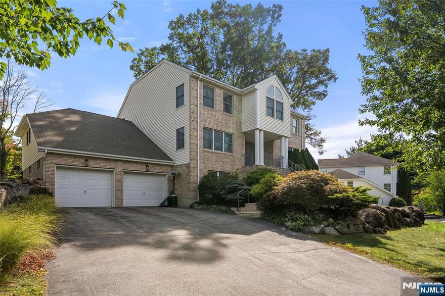 Welcome to this beautiful 4-bedroom, 2.5-bath Center Hall Colonial, built in 1994 and set on a quiet cul-de-sac in one of Wayneâ€™s most sought-after neighborhoods. The home features a newer gourmet kitchen with granite countertops, high-end Viking stainless steel appliances, custom cabinetry, center island, and a spacious pantry. An open floor plan flows into the breakfast room with sliding glass doors to a large maintenance-free deck overlooking a huge backyardâ€”ideal for entertaining. The two-story family room offers soaring ceilings, tons of natural light and a cozy gas fireplace, complemented by a formal dining room and private library. The primary suite includes a tray ceiling, walk-in closet, and a luxurious bath with jacuzzi tub and stall shower. The finished basement expands the living space with a granite wet bar and recreation room. Additional highlights include hardwood floors on the first floor, recessed lighting throughout, central air, sprinkler system, 2-car attached garage, and ample driveway parking. Conveniently located near top-rated schools, community activities, shopping (Trader Joeâ€™s, Whole Foods), Wayne Public Library, restaurants, cafes, parks, major highways, and NJ Transit bus and train service for an easy NYC commute. Donâ€™t miss the opportunity to call this stunning colonial your new home!