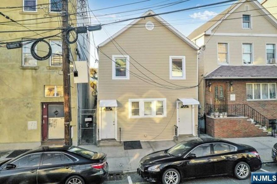 3 family investment opportunity or live-in and collect $$$ on the Harrison Border. 20 min to Harrison PATH. Well-kept, fully rented home. 2 units on 1st floor: front apt 4 rms, 2 bedrooms, 1 bath rented at $2,000 m/m, rear apt 5 rms, 3 bedrooms, 1 bath rented at $2,650 with basement access. 2nd-floor unit: 5 rms, 2 bedrms, 1 bath (includes finished attic); rented at $1,850 m/m; hardwood floors; tiled kitchen & baths. Finished basement with recreation room & full bathroom- separate entrance. 3 separate gas hot water baseboard heating systems, 3 water heaters. Separate gas & electric meters. State inspection valid until 10/7/2027.