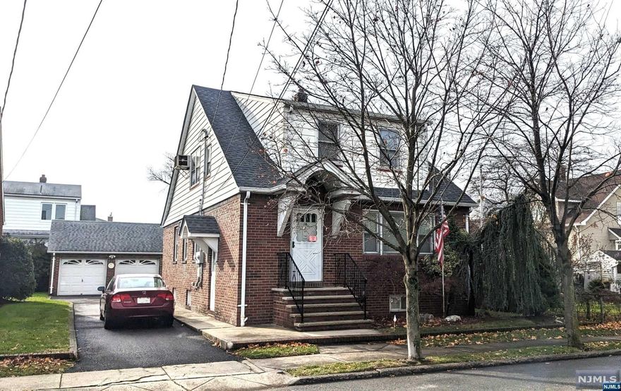 Well maintained Brick 2 Family with large detached 2 car garage in a prime location!! Large living room, Dining area, Kitchen with granite countertops, 2 bedrooms, and full bath on 1st floor. Second floor includes a large living room, Kitchen/dining area, 1 nicely-sized bedroom with 2 walk-in closets, and a full bath. Hardwood floors under carpeting. Large and dry semi-finished basement with tons of storage and laundry hookups. Detached 2 car garage with long 3 plus car driveway. Spacious backyard. 1 furnace, 2 Gas Meters, 2 Hot water Heaters, 2 Electrical meters, and wall A/C units. In close proximity to NYC transportation, shopping, and schools. Property is not located in a flood zone.