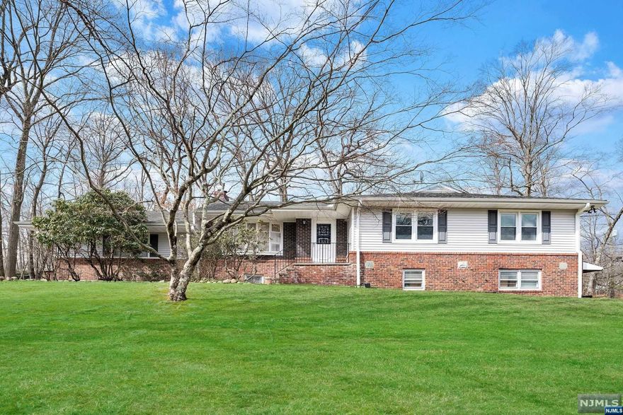 Welcome to this impeccably maintained 4-bedroom, 2.5-bathroom home nestled in the prestigious Upper Saddle River. Boasting a 7-year-old roof, recently updated mechanicals, French drains encircling the property, and stunning hardwood floors beneath the carpet on the first floor. Very large newly finished lower level. This residence offers the perfect canvas for expansion or renovation. Enjoy the benefits of an exceptional neighborhood, top-tier schools, remarkably low taxes, and the added delight of a beautiful flat backyard, perfect for outdoor enjoyment and entertainment. The house is being sold as is, presenting an exciting opportunity for customization and personalization.