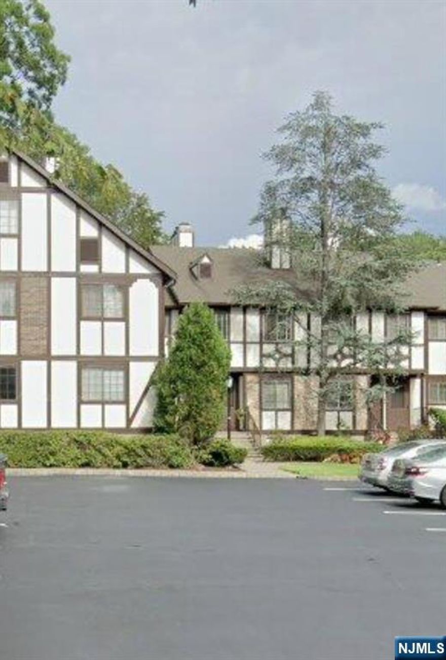 CHARMING FIRST FLOOR CONDO FEATURES ENTRY FOYER, KITCHEN, OPEN FLOOR PLAN LIVING ROOM WITH WOOD BURNING FIREPLACE AND DINING ROOM, BALCONY, BEDROOM WITH DOUBLE CLOSETS, FULL BATH AND DEN/SECOND BEDROOM. CONVENIENTLY LOCATED CLOSE TO PARKING, POOL AND TENNIS COURTS.