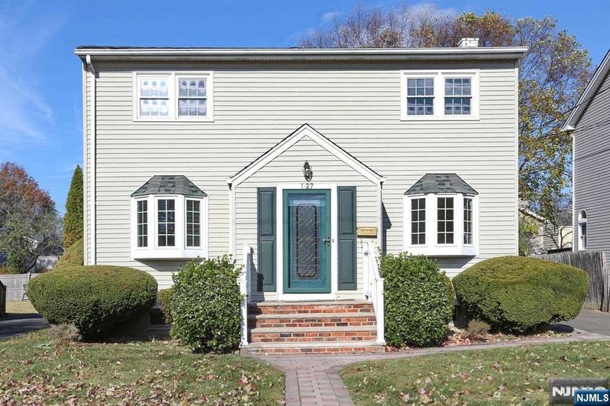 NICELY MAINTAINED 4/5 BEDROOM 2 BATH CENTER HALL COLONIAL HOME LOCATED ON WELL MAINTAINED LEVEL PROPERTY. THIS HOME FEATURES AN ENTRY FOYER WITH LEADED GLASS FRONT DOOR, LARGE LIVING ROOM, FORMAL DINING ROOM AND AN EAT-IN KITCHEN, A FULL BATH AND DEN/5TH BEDROOM. UPDATES INCLUDE WINDOWS AND VINYL SIDING. HARDWOOD FLOORS ON FIRST FLOOR, FULL FINISHED BASEMENT WITH ROUGH PLUMBING FOR A BATHROOM, STORAGE AND LAUNDRY. CONVENIENT LOCATION WALK TO TOWN POOL, SCHOOLS, STORES AND TRANSPORTATION! DONT MISS THIS WONDERFUL HOME AND OPPORTUNITY!!