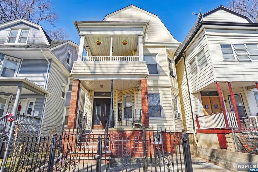 Meticulously maintained updated two family + bonus income producing or owner occupied with rental revenue in one of the most desirable areas of East Orange. Each unit offers a large living room, eat-in kitchen, three (3) bedrooms, and a full bathroom. The Third Floor Bonus unit offers a bedroom, living room, and summer kitchen. Property has a private/gated parking space for one. Fully finished basement for additional living area. For an investor this property can generate +$4,400 monthly and as owner occupied it is bringing $2,900 monthly to cover the majority of their mortgage. A few blocks from Watsessing Park, and close to two major train stations (Orange Train Station & Bloomfield Train Stations).