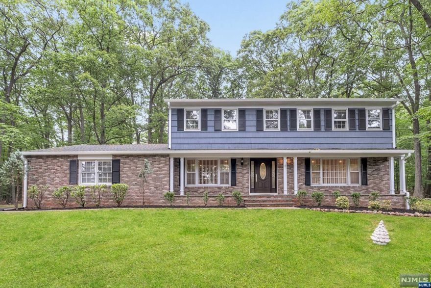 Beautiful newly renovated house in sought after Fardale section of Mahwah. Brand new Roof, Gutter, Garage Doors (9'x7'), Driveway and Hardwood floor. Anderson 400 French door, patio door, casement window in Kitchen, double-hung windows in 4-season Sunroom and master bathroom. The 1st FL offers open floor plan kitchen with dining rm and formal living rm, family rm/fireplace, mud rm/washer & dryer, powder rm and 4 season Sunroom. Enjoy the modern kitchen with Kraftmaid cabinet, breakfast bar, glass backsplash, granite countertop, recessed lighting, cabinet lighting, undermount sink and stainless steel appliances. The 2nd FL has master bedrm/ master bath, three spacious bedrooms and full bath. Master bath features free-standing tub, walk-in steam shower with center rain shower head, double vanity, Grohe plumbing fixtures and radiant heat. All bedrooms comes with ample brand new customized built-in California closets. Original solid wood door with new finish. Owner holds NJRE license.