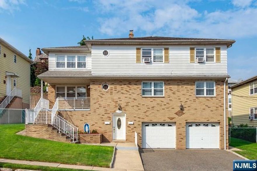 Bright and spacious 2 family home offering 8 bedrooms and 5 bathrooms! This coveted south facing, brick and aluminum sided home has been well maintained. The first floor offers a living room, dining room, kitchen, foyer, 3 bedrooms and 2 full bathrooms. The second floor offers a living room, dining kitchen, large storage closet, 3 bedrooms and 2 full bathrooms. The basement has a separate entrance with living room, kitchen, two bedrooms, a full bath and a laundry room. There is a two car garage and parking for 4 cars in the driveway. Private backyard with patio. Located in a very convenient section of Palisades Park steps from Broad Ave, close to schools, shopping and restaurants. It is within walking distance to NYC buses. Great investment property!