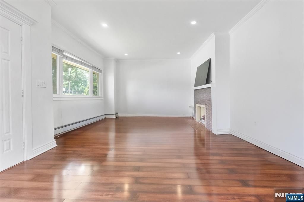 Photo of 334 Brook Avenue, Passaic, NJ 07055 (MLS # 26025875)