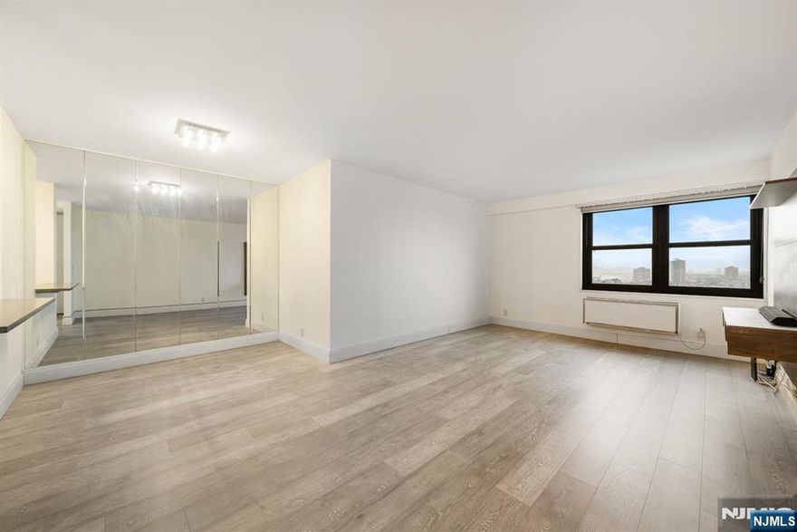 Come and enjoy living in this beautifully remodeled 1-bedroom condo with stunning Southeast NYC and Hudson River views at the Parker Imperial. Completely upgraded in 2018, this home offers a bright open-concept layout and modern finishes throughout. The spacious kitchen features a breakfast/serving bar, sleek modern white cabinetry, quartz countertops, white appliances, and a stylish two-tone backsplash. It opens seamlessly to the dining area and large living roomâ€”showcasing beautiful NYC views. The upgraded bathroom is generously sized and finished with quality fixtures, a modern vanity and lighting, elegant tile work, and a high-end glass shower door. Beautiful laminate floors run seamlessly throughout the home, complemented by upgraded lighting, window blinds, and abundant organized closet space. The large bedroom also features NYC and Hudson River views along with a walk-in closet. A must-see to truly appreciate! The Parker Imperial offers exceptional amenities, including a 24/7 doorman, fitness center, outdoor heated pool, and laundry facilities on every floor. Its prime North Bergen location borders a 167-acre park with a lake and free tennis/pickleball for residents, and provides easy access to transportation, shopping, and dining. Bus service to NYC, Hoboken, and Jersey City is conveniently located right at the door. Sorry no pets. Come for a tour while itâ€™s still available! Call Jimmy Lopez 201-741-6298 for all showings.