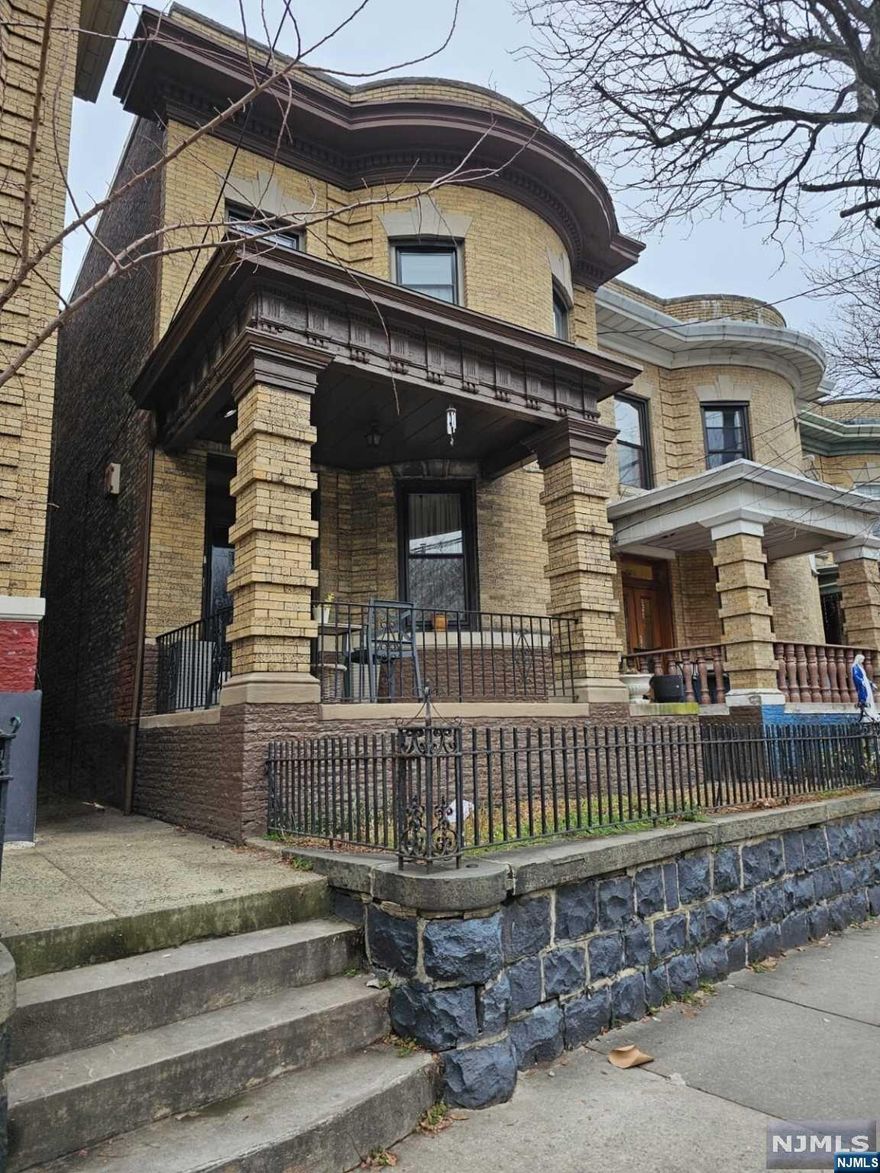 Introducing a captivating 2-family home in Jersey City Heights, NJ. Boasting 5 bedrooms and 2 baths, it offers spacious living with high ceilings and gas fireplaces. Modern kitchens, hardwood floors, and a full basement with walkout. Each unit has separate utilities, and the backyard is perfect for relaxation. Nestled in a vibrant community minutes from Hoboken, this home blends comfort with elegance. Welcome to this turn key residence - your ideal haven in Jersey City Heights.