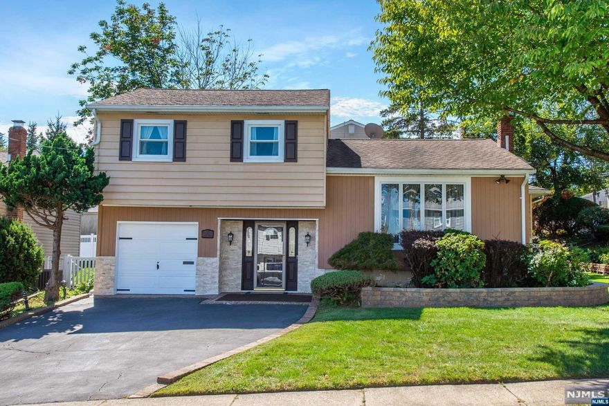 Enjoy your very own space at your new home! This 3 bed, 2 bath home on a corner lot is nestled in desired Maple Valley section! Gorgeous curb appeal with beautiful landscape with long driveway adorn this stunning split-level, extended home. A warm foyer flows up the stairs to great living area bathed in natural light. Open floor plan moves into family room with wall-to-wall windows and formal dining area. Beautiful farm-house style kitchen with ample cabinets and modern lights adorn chef-grade kitchen with SS appliances. 3 spacious bedrooms with perfect closet space are ready for your relaxation. Finished basement is a perfect flex room! Windowed sliding doors open to private paved patio with stunning views of manicured landscape. Vinyl fencing encloses your personal backyard, great for get-togethers. Close to major highways, schools, NY transit, and shopping.