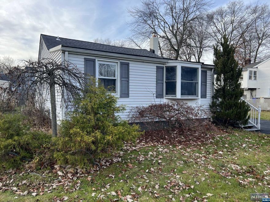 Spacious 3 bedrooms 1 bath ranch on over 8000 sqft lot and in the Lake Parsippany section ($135 per year is mandatory without beach access - $290 per year gives access to beaches at the lake). Large kitchen, family room, basement is crawlspace. Central air conditioning. 2 car garage. large deck. Vinyl siding. SOLD STRICTLY AS IS !!! Please present your best offer by Sunday night, December 10. Buyer is responsible for all required certificates from the town.