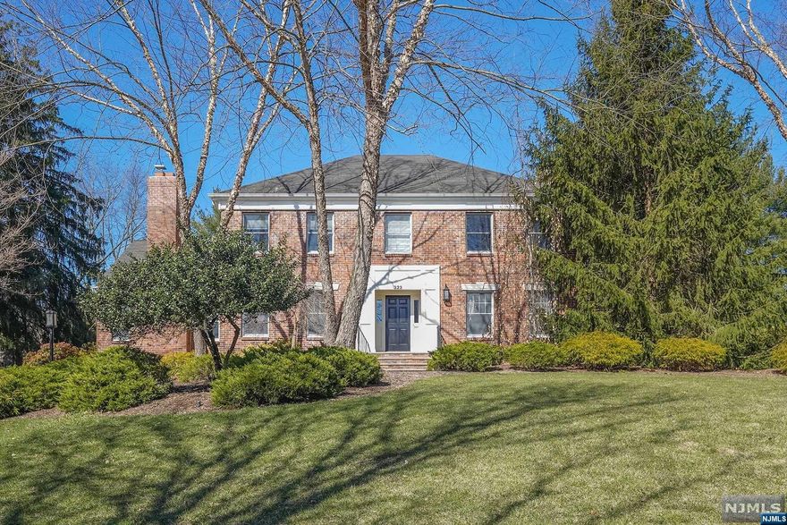 This charming home in Saddle River, has been updated to offer a perfect blend of modern amenities and traditional charm. From the moment you arrive, you'll be impressed by the beautifully landscaped front yard. Upon entering, you'll be greeted by an abundance of natural light flowing through this well-maintained home. The updated kitchen features modern appliances, granite countertops, and plenty of cabinet space for all your cooking needs. The adjacent dining area and living room provide ample space for gatherings. The home boasts 5 bedrooms and 5 bathrooms including 2 primary suites with luxurious ensuite baths with double sinks and water closets. Each bedroom is spacious with plenty of closet space. A great feature of this home is the beautiful backyard. Sliders off the kitchen take you outside onto the bluestone patio and you'll be greeted by a serene and private backyard that is perfect for relaxing and entertaining.