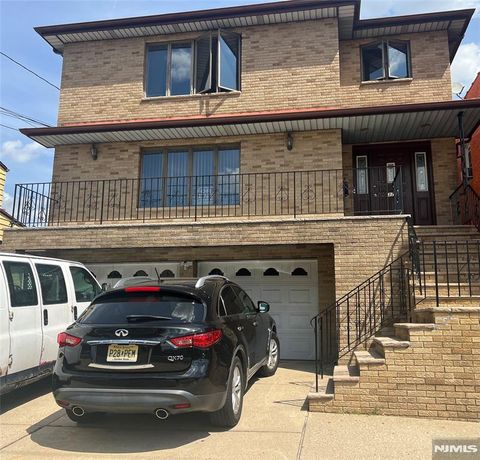 Photo of 373 Jersey Ave, Fairview, NJ 07022 (MLS # 25034681)