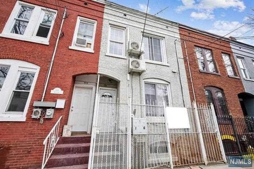 Tastefully renovated row house awaits you. Home features two large bedrooms (including ensuite bathroom), laundry room (with hookups), and spacious yard (great for entertaining). The finished basement serves as a great playroom, den, office, or even third bedroom. Located in the highly desired North Newark neighborhood, the property is surrounded by everything the area has to offer, including Branch Brook Park. Commuter friendly home is steps from public transportation and a short drive to and from most major highways. Don't miss out on this fantastic opportunity for home ownership in great neighborhood