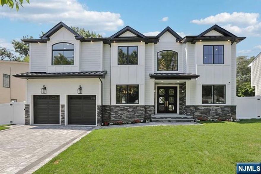 Brand new construction masterpiece on the ULTRA-DESIRABLE East side of Paramus featuring approx. 6,500 sq ft. Stunning 2 story entry foyer w/heated marble floors leading to FLR & FDR w/custom trimwork, & beautiful 6" white oak hardwoods throughout. Butler's pantry leads to dream kitchen w/oversized waterfall island, matching quartz backsplash, professional appliances, walk-in pantry, breakfast area & wet bar. Stately 2 story FR w/fireplace & custom trimwork. Elegant PR, bed w/full bath, & mudroom complete 1st fl. 2nd fl features large primary suite w/2 WICs & spa bath w/huge walk-in shower, soaking tub, & heated floors. Jr suite w/full bath, 2 more beds, full bath, & laundry complete 2nd fl. Full finished basement w/home theater, gym, large rec room w/wet bar, bed, & full bath. 9 ft ceilings on all floors, security cameras, speakers, central vac, sprinklers, generator, & fenced yard. Paramus is home to amazing schools, LOW TAXES, easy commuting, & great shopping.