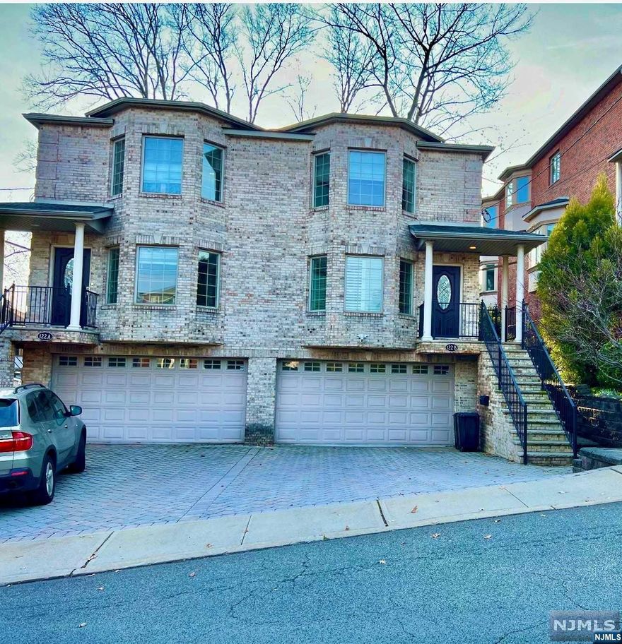 Amazing location, price & condition! True oversized duplex in the best section of town. Large rooms. Ample closet space. Beautiful custom trim work, bar and new GLAM closet! Hardwood floors throughout. Fireplace. Garage. Freshly painted. Large backyard completely fenced in with extended deck, yard furniture is included. Walking distance to NYC buses and shopping. Look no further for the perfect rental!