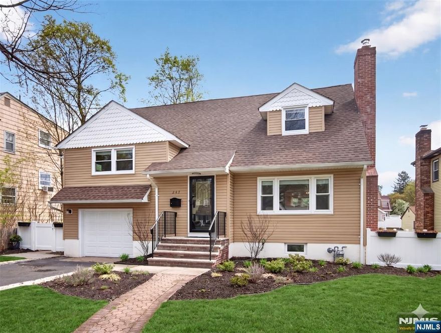 Nestled in the heart of Ridgewood, this charming split-level home blends comfort, character, and modern updates. With 4 bedrooms and 2.5 baths, it offers versatile living across multiple levels. The first floor welcomes you with a bright living room and dining area, while the updated kitchen, complete with radiant heat floors, overlooks the beautifully fenced yardâ€”perfect for entertaining or play. The second floor features two spacious bedrooms and a renovated full bath. Upstairs, discover two additional bedrooms, another updated bath, and steps leading to a private bonus room ideal for a home office, studio, or playroom. The lower level enhances everyday living with a convenient half bath, mudroom, and dedicated laundry area, providing both functionality and organization. The finished basement offers even more flexibility, featuring a comfortable family room or additional living spaceâ€”perfect for relaxing, entertaining, or accommodating a variety of lifestyle needs. Enjoy year-round comfort with 4-zone heating and central air. Located close to vibrant downtown Ridgewood, parks, schools, and transportation, this home beautifully combines suburban serenity with convenience to all the village has to offer. WANT MORE INFO? CONTACT LISTING AGENT NICOLE MINETTI @ 201-388-0077//nicole@minettidennisgroup.com