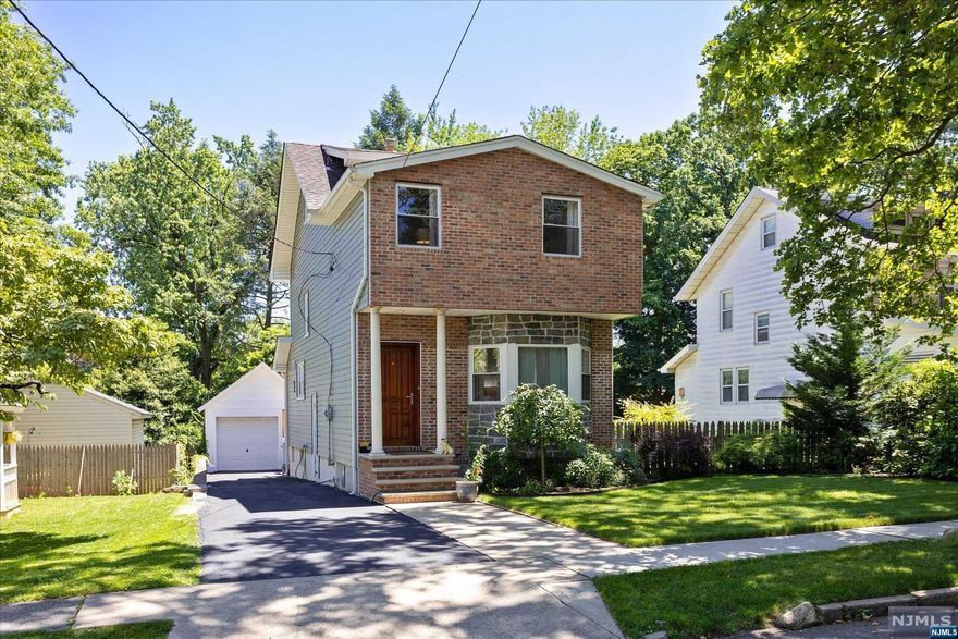 Located in the heart of Rutherford, walking distance to the train station, this 4 bedroom colonial offers so much to love with 4 levels of living space! Walk through a bright living room with a charming bay window and into the recently remodeled kitchen featuring white cabinets, new stainless steel appliances and granite countertops. The family room features sliding doors that lead to a brand new deck overlooking a private yard, garage and driveway. The second floor offers 3 spacious bedrooms and an updated granite-counter bathroom. Add an additional bedroom on the third floor or transform it into a private home office. Looking for a game room or play room? The fully-finished basement adds even more customizable space. With additional perks of easy access to the best dining/shopping (American Dream) and one of Jersey's best school systems, this turnkey home is ready for its next family!