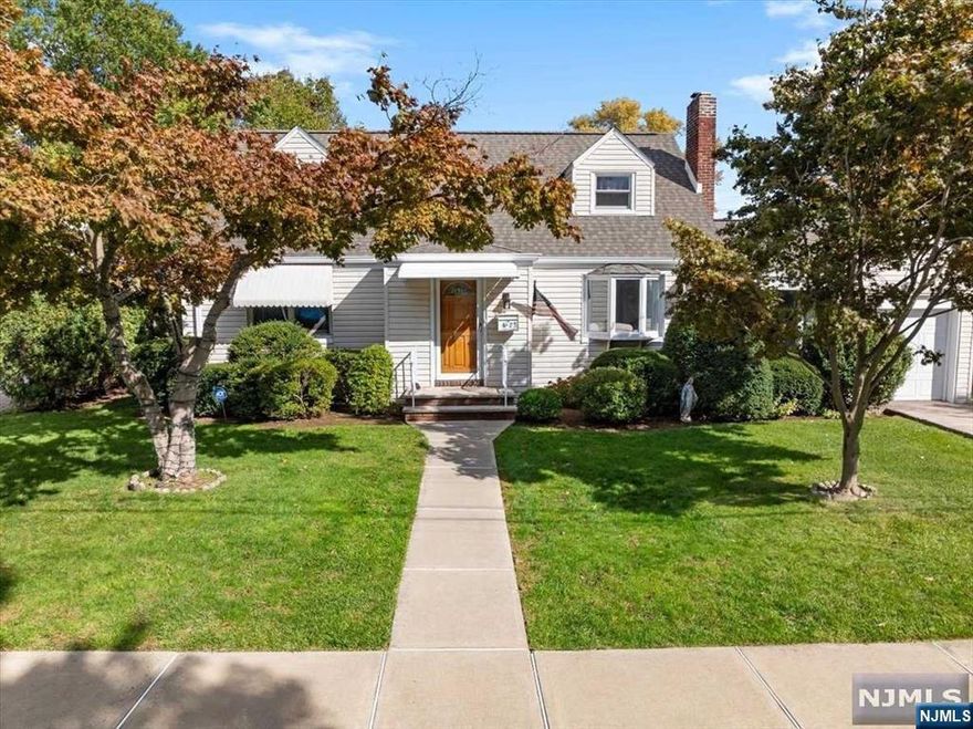 Welcome to this charming large 5 bedroom, 3 full bathroom home, offering over 2,100 sqft of living space on a generous 7,400 sqft lot. Recent updates include a new roof and gutters (2023) & beautifully updated bathrooms on every level, complemented by beautiful hardwood floors throughout. The spacious 1st fl layout features a cozy wood-burning fireplace, family room, guest room, and a large master bedroom. The full-sized, high-ceiling finished basement offers addt'l rooms with plenty of storage including a fully equipped summer kitchen & full bath making it perfect for entertaining. Step outside to a massive flat yard, surrounded by high hedges for privacy, along with a covered patio for outdoor relaxation. Additional features include air and water purifiers, a security system, in-ground sprinklers, and some newer Anderson windows. This home is also conveniently located near public transport to NYC, as well as schools and houses of worship. Best & Final due on Thur. 10/24 @ 12pm