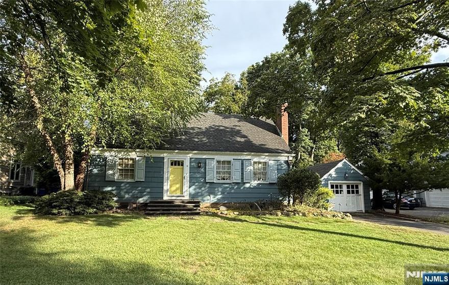 Welcome to this charming 3 bedroom 2 full bath home on one of the most desirable blocks in East Hill Demarest. The bright layout features a spacious living room with a gas fireplace, a sun-filled eat-in kitchen with stainless steel appliances, granite island counter, and bay window, plus wood floors throughout. Two bedrooms and a full bath are on the first floor while the private primary suite upstairs offers an en suite bath and abundant closet space. Additional highlights include central air conditioning, a finished basement with bar, backyard deck, one car detached garage, and a wide flat lot with a large yard suitable for entertaining, outdoor activities, or adding a pool. This beautifully maintained home also offers excellent potential for future expansion and is ideally located close to top schools, shopping, and NYC transportation. Priced to sell, this is a rare opportunity in East Hill Demarest. *More pictures coming soon