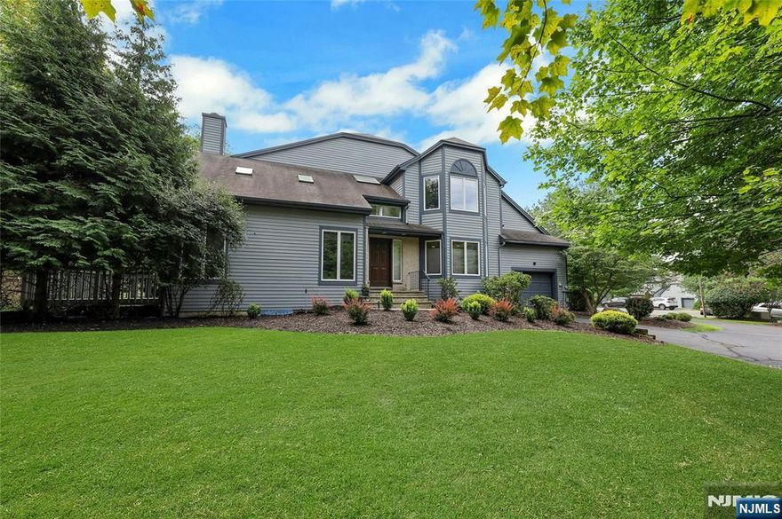 Welcome to 24 Fair Ridge Ct tucked away in an intimate cul-de-sac community. This beautifully maintained 2 bdrm, 3.5 bath townhouse offers the perfect blend of privacy, comfort, and convenience. Step inside this bright and inviting two story entry foyer featuring a spacious Living room and Dining room combo.The eat-in kitchen offers ample cabinetry and counter space, making meal prep a breeze. Upstairs, you will find two generously sized bdrms, one being the primary bdrm with two walk-in closets and a beautiful en suite bath with soaking tub. The finished lower level offers incredible versatility with a full bath, home office and recreation space. Enjoy your morning coffee or evening unwind on the private deck, with serene wooded surroundings. Located in sought-after Wayne, NJ, this home offers easy access to shopping, dining, parks, and major commuter routes, all while being part of a quiet, well-kept neighborhood that feels worlds away from the bustle. Don't miss out on this one and schedule your showing!