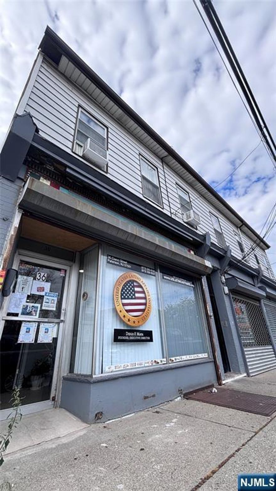 BOM BUYER COULD NOT PERFORM --Attention Investors: TWO buildings for THE PRICE OF ONE! Building #1 features two residential apartments and three storefronts, all with separate utilities. Building #2, located at the rear of the property, includes six apartments, each with separate gas utilities. Located in downtown Paterson and close to all major transportation. This fully occupied property offers a strong investment opportunity. The seller holds a valid Green Card. ALL RESIDENTIAL UNITS and COMMERCIAL SPACES ARE FULLY RENTED.