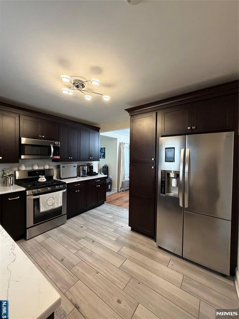 Photo of 128 8th Street, Clifton, NJ 07011 (MLS # 26026910)
