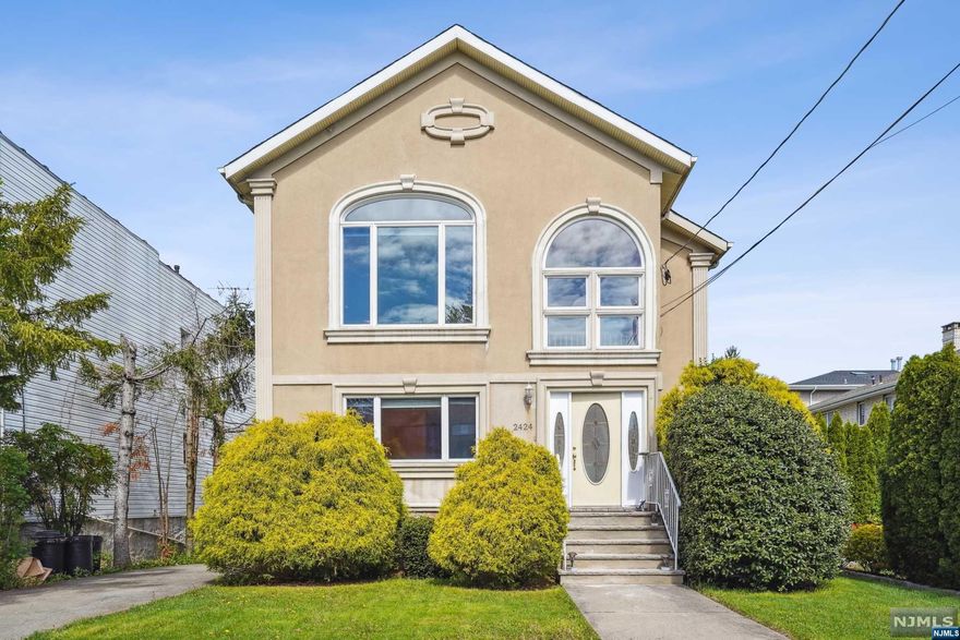 Welcome to this expansive and modern colonial home situated on a tranquil and accessible street. Upon entering, you'll be greeted by the elegance of hardwood floors that flow seamlessly throughout the entire residence. The kitchen exudes contemporary charm, boasting sleek granite countertops, high-quality cabinets, and top-of-the-line stainless steel appliances. In addition to the main house, a detached two-car garage provides ample parking space. The fully finished basement offers versatility for various needs, allowing for multi-purpose utilization. With its close proximity to schools, shopping centers, parks, and convenient access to NYC buses, this property is truly a must-see.