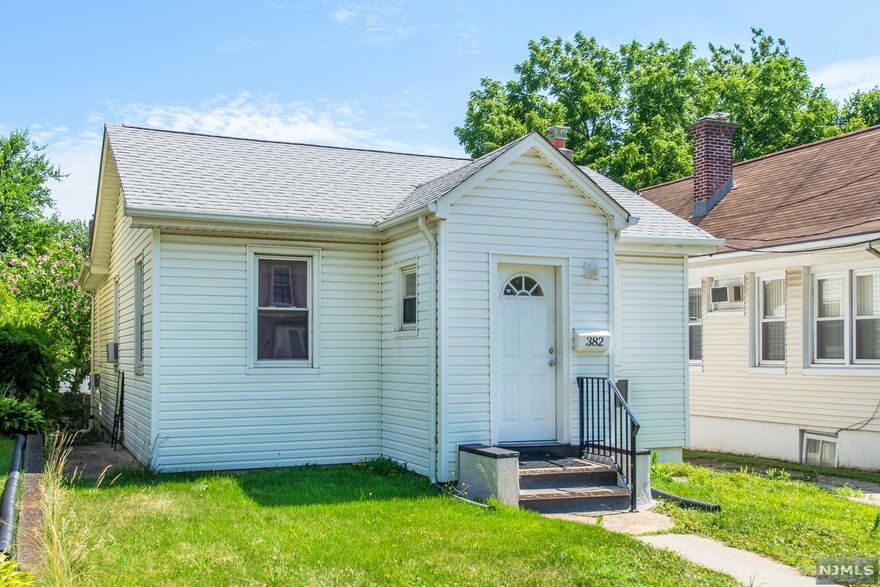 COMMUTER'S DREAM! This wonderfully kept Cape Cod is steps from the bus to NYC! If you are looking to be close to the city, or simply want to enjoy the wonderful benefits the desirable Delawanna Section of Clifton has to offer, this house is for you. Just minutes from dozens of grocery store and restaurant options, you can have your pick! Not to mention, about 50 feet from Dunney Park! The home features a "one floor living" vibe, with a spacious living room w/ exposed wood beam ceilings & formal dining room & updated HDWD floors throughout. Eat in Kitchen w/ tons of storage, and a large bath. Closet space everywhere! Basement has been freshly painted and sealed, perfect for workshop, office, or rec room. BRAND NEW furnace, updated electric, newer roof and chimney. Private backyard for your own oasis, w/ above ground pool and pavers. All you have to do is move in!