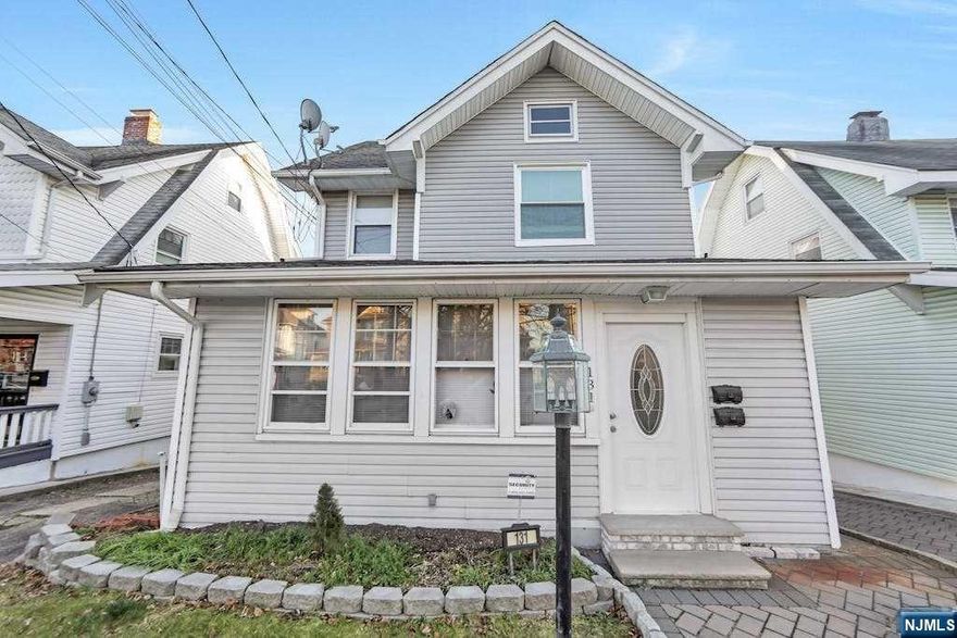 Welcome to this meticulously maintained Two-Family home w numerous enhancements. The curb appeal invites you into the 1st-floor apt featuring 2 bedrooms, a renovated kitchen w granite counters, stone tile floor, & a large sunlit bay window. The remodeled full bath boasts stained glass accents, while the formal living room hosts a cozy wood-burning fireplace. 1st floor apt has access to the full basement w versatile multi-purpose room, laundry, storage, & a workshop. The 2nd-floor apt offers 3 bedrooms, a recently remodeled eat-in kitchen w a pantry, & a just-renovated full bath. 2nd floor apt additional highlight is access to a finished attic currently used as the 3rd bedroom. Home showcases parquet wood floors, most replaced windows, brand new carpet in hallway & 2nd floor apt, 2 updated electric panels, brand-new hot water heater, & a 30-year shingle roof. The property also offers a sizable fenced-in yard & driveway. This home seamlessly combines classic charm w modern updates.