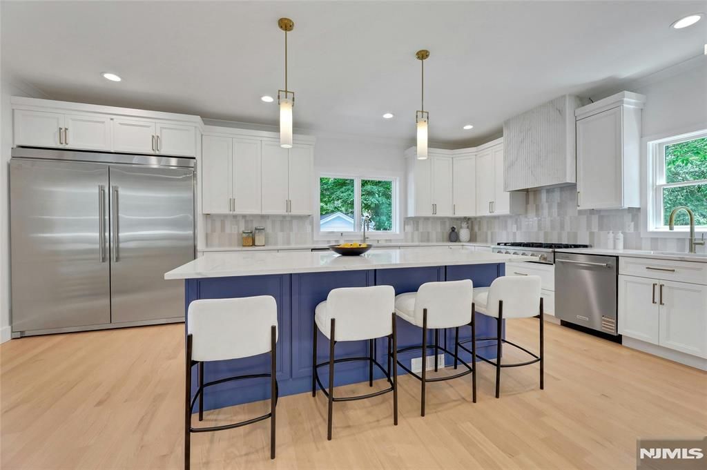 Photo of 273 W Englewood Avenue, Teaneck, NJ 07666 (MLS # 25037354)