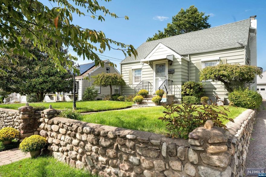 Amazing Opportunity! Spacious Storybook Cape with Great Flow for Entertaining. 2/3 Bedrooms, 1st Floor Full Bath. Huge Eat-in-Kitchen with Sunny Breakfast Room plus Family Room. Bright & Airy Throughout. 2nd Floor Loft - Perfect future Master Suite! Finished Lower Level complete with Family Room, Half-Bath, Wet Bar and Wine Room. Hardwood flooring. High Ceilings. Detached Garage. New Roof. Large Patio complete with Koi Pond. Beautiful Stonework. Property Professionally Landscaped with Specimen Trees and Plantings. Level 50x 100 Lot. Easy Access to Highways. Truly a Unique Home. So SWEET!