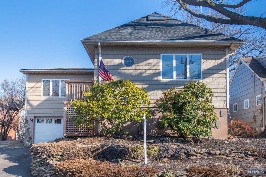 This Charming 3 bedroom 2 bath home features hardwood floors, central- air, newer roof, eat in kitchen with separate eating area, stainless steel appliances, and finished basement. Enjoy the backyard with beautifully landscaped yard. This adorable home is close to shopping, restaurants, and transportation. Don't miss out on this great opportunity!