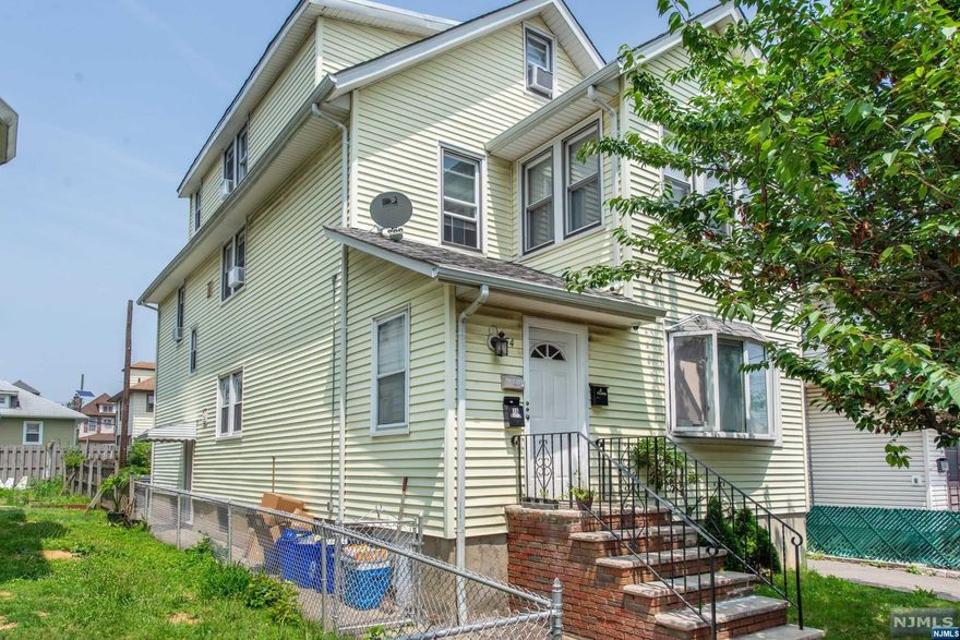 Ideal investment property!All excellent month to month tenants stay in this state certified legal 3 family,lovingly cared for over the years.Great curb appeal & lovely neighborhood,separate utilties & near public transportation.No rent control under four family in Belleville.