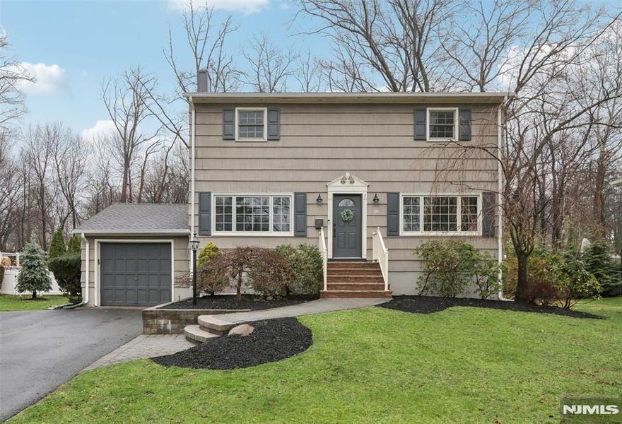 Nestled in the heart of Glen Rock, this beautifully maintained, turn-key center hall Colonial offers the perfect blend of modern upgrades and quintessential suburban charm. Ideally located just blocks from the train station and downtown shops, this 3-bedroom, 2-bath residence features an energized open concept with extensive 2018-2024 renovations. Off the entry, recently refinished hardwood floors lead you through a living room that flows seamlessly into the family area, formal dining room, and 2024-renovated chefâ€™s kitchen showcasing brand-new custom cabinetry, quartzite countertops, and stainless steel appliances. A full bathroom completes the first floor. Upstairs consists of three ample-sized bedrooms with generous closet space and a remodeled hallway bath. The finished lower level provides valuable bonus space perfect for a recreation room, media room, playroom, home office, or gym, plus ample storage. Significant system upgrades offer peace of mind, including a newer furnace, central A/C, and whole-house water filter and softener. Outside, the property features an expansive Trex deck added in 2023, overlooking the backyard and creating an ideal setting for outdoor entertaining. Situated just around the corner from Wilde Memorial Park and within a half-mile of top-rated schools, this home offers exceptional access to parks, schools, shopping, and commuter transportation. Opportunity awaits!