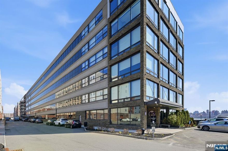 Welcome to The Pearlâ€”one of Edgewaterâ€™s premier waterfront buildings. This beautiful 1-bedroom, 1-bath home offers panoramic eastern views of NYC and the Hudson River. Featuring 10-foot ceilings, 8-foot doors, and natural hardwood floors throughout, the home flows into a spacious open-concept living, dining, and kitchen area with floor-to-ceiling windows showcasing incredible natural light and skyline views. Custom built-in closets and a chefâ€™s kitchen with top-of-the-line appliances make this home as functional as it is stylish. The bathroom features a sleek, spa-like design. Additional highlights include in-unit laundry and one assigned garage parking space. Full-service amenities include a 24-hour concierge, fitness center, outdoor heated pool, and roof deck. Conveniently located near restaurants, shopping, and everyday essentials including Whole Foods and Trader Joeâ€™s.