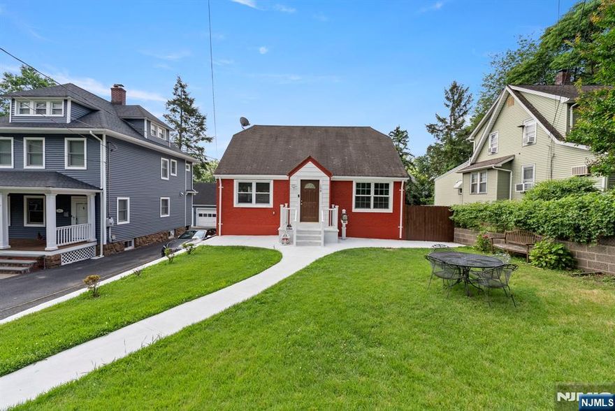 Move-in Ready 4 Bedroom, 3 Full Bathroom home in prime Tenafly location. This sunlit residence features an updated kitchen with stainless steel appliances, spacious bedrooms, stylish bathrooms, and luxury floors throughout. Fully finished lower-level suite offers flexible living space. Private deck for entertaining, large fenced yard, 3-car driveway parking, and top-rated school district. Mackay elementary, Tenafly Middle School, and Tenafly High School all within a 5-minute walk. Close to parks, shops, and NYC transit!