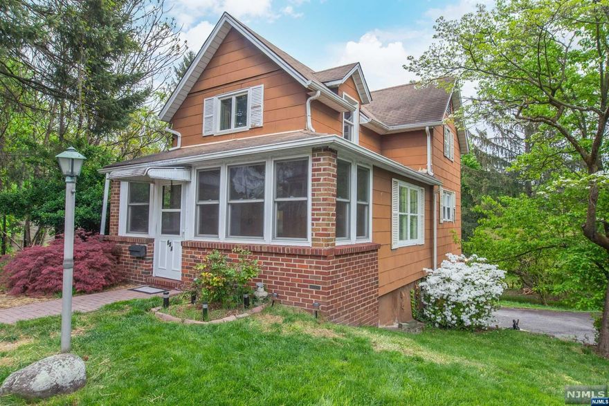 Amazing opportunity to become a homeowner in the sought after town of River Edge. Situated on a large sun-filled lot, you can add your own personal touches and make this house your own. 3 nice sized bedrooms, 2 full baths, living room, dining area and kitchen. Fully finished ground level with a large family room that has its own entrance to the spacious backyard, making it perfect for entertaining & Summer BBQ's. Oversized, two-car, barn garage with tons of additional storage. Large driveway with space for at least 6+ cars. Close to award-winning schools, NYC transportation & shopping. Home being sold As-Is. SELLERS ASKING FOR HIGHEST & BEST BY 10AM FRIDAY (5/12)