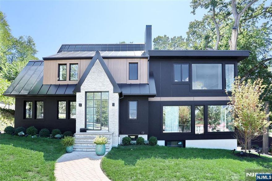 Eloquently Appointed Custom Residenceâ€“Where Timeless Elegance Meets Modern Luxury. Step into a world of refined sophistication in this masterfully re-imagined six-bedroom home, where contemporary luxury is seamlessly infused with European-inspired design. Expanded and fully renovated, this residence offers the perfect harmony of form and function. A grand new addition compliments the original structure, introducing a sense of scale and flow for everyday living and entertaining. The heart of the home is a state-of-the-art kitchen, with designer finishes, and details tailored for culinary enthusiasts. Floor-to-ceiling windows bathe the interior in natural light, highlighting the artistry and craftsmanship. Bedroom suites provide a private retreat, with bespoke finishes and custom closets. Stunning flooring span the home, featuring a curated blend of white oak and imported Spanish tile. The finished 3rd fl offers addtl versatility, perfect for a studio or office. Distinguished architectural elements include European metal roofing, tilt-and-turn windows, and sophisticated finishes that elevate every room. A guest or extended family suite, with a summer kitchen and private entrance, offering both privacy and convenience. A separate rear structure w/vaulted ceilings is ideal for home office or studio. A flowing yard invites endless possibilities. Close proximity to top-rated schools, shopping, mass trans, trails, and the picturesque Haworth Pond. Come fall in love...ITâ€™S PRISTI
