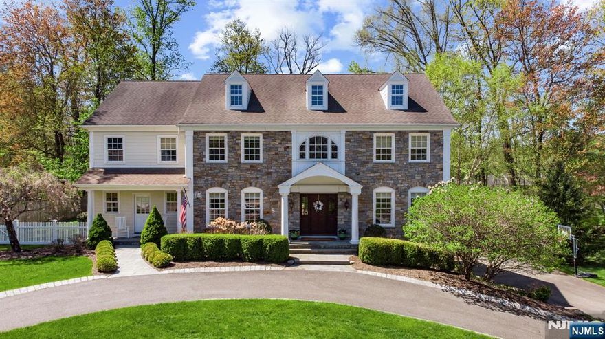 Discover timeless elegance and everyday comfort in this exquisite custom Colonial home, offering over 4,682 sq ft of refined space. From the grand two-story foyer with travertine marble floors to the formal living and banquet-sized dining rooms, every detail offers a perfect blend of luxury and timeless elegance. The gourmet chefâ€™s kitchen features top-tier appliances and radiant-heated floors, overlooking a beautiful family room with a wood-burning fireplace. Upstairs, five spacious bedrooms include a luxurious primary suite with dual walk-ins and a spa-like en-suite bath. Downstairs, the finished basement offers new carpeting, rec and fitness areas, a powder room and direct garage access. Set on .65 acres and located in a sought-after community with top schools and easy NYC access, this home blends upscale living with everyday comfort.